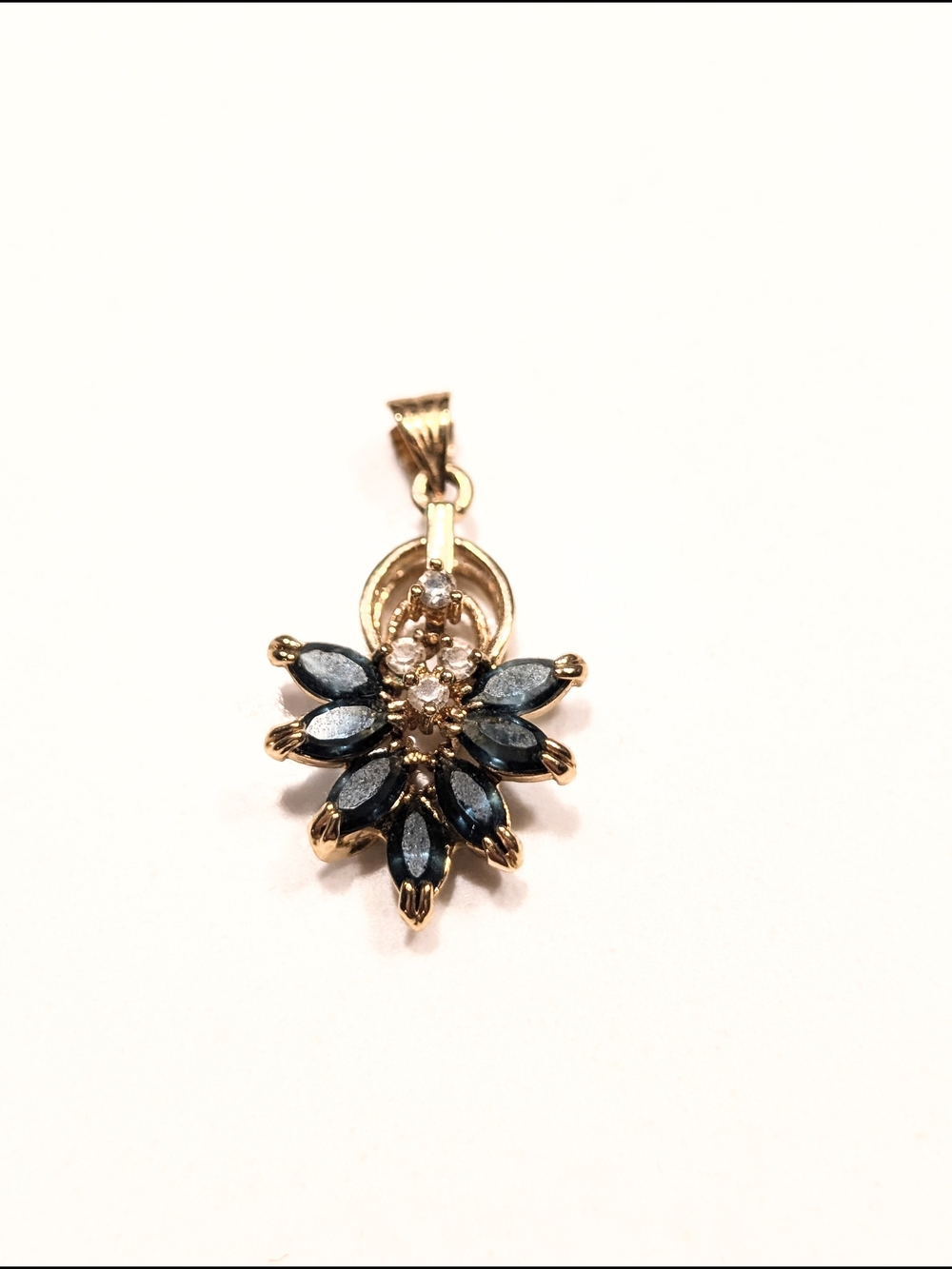 Vintage Gold Floral Pendant with Dark Blue Marquise Stones